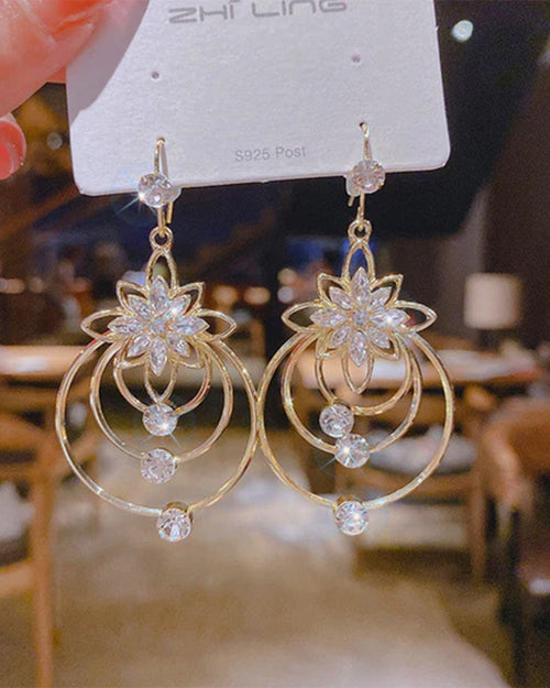 Boucles d'oreilles trois créoles lotus en cristal 0