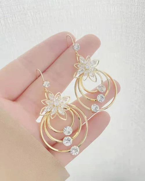 Boucles d'oreilles trois créoles lotus en cristal 1